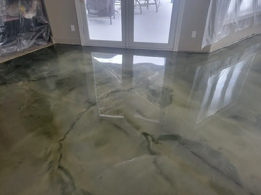 Pearl metallic epoxy floor installed in a residential living space