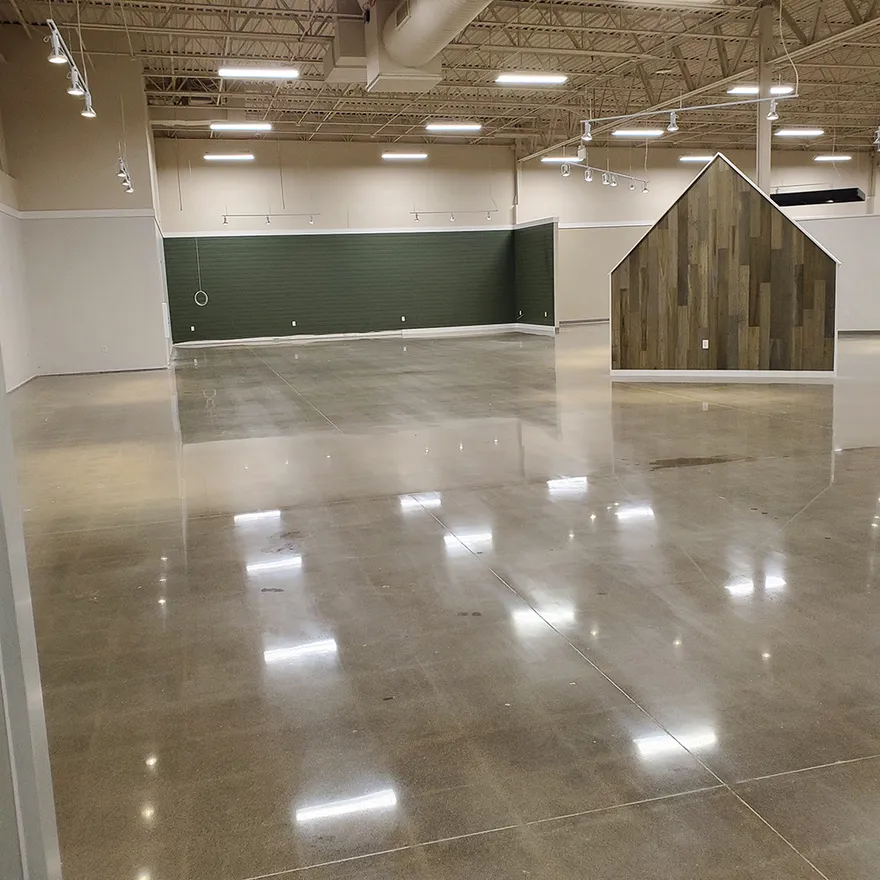 Polished concrete floor in a large commercial retail space